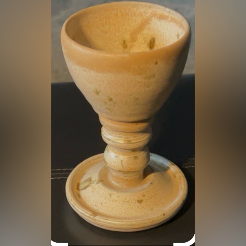 Studio art pottery, with a hand-carved signature on the base that reads "MAG".